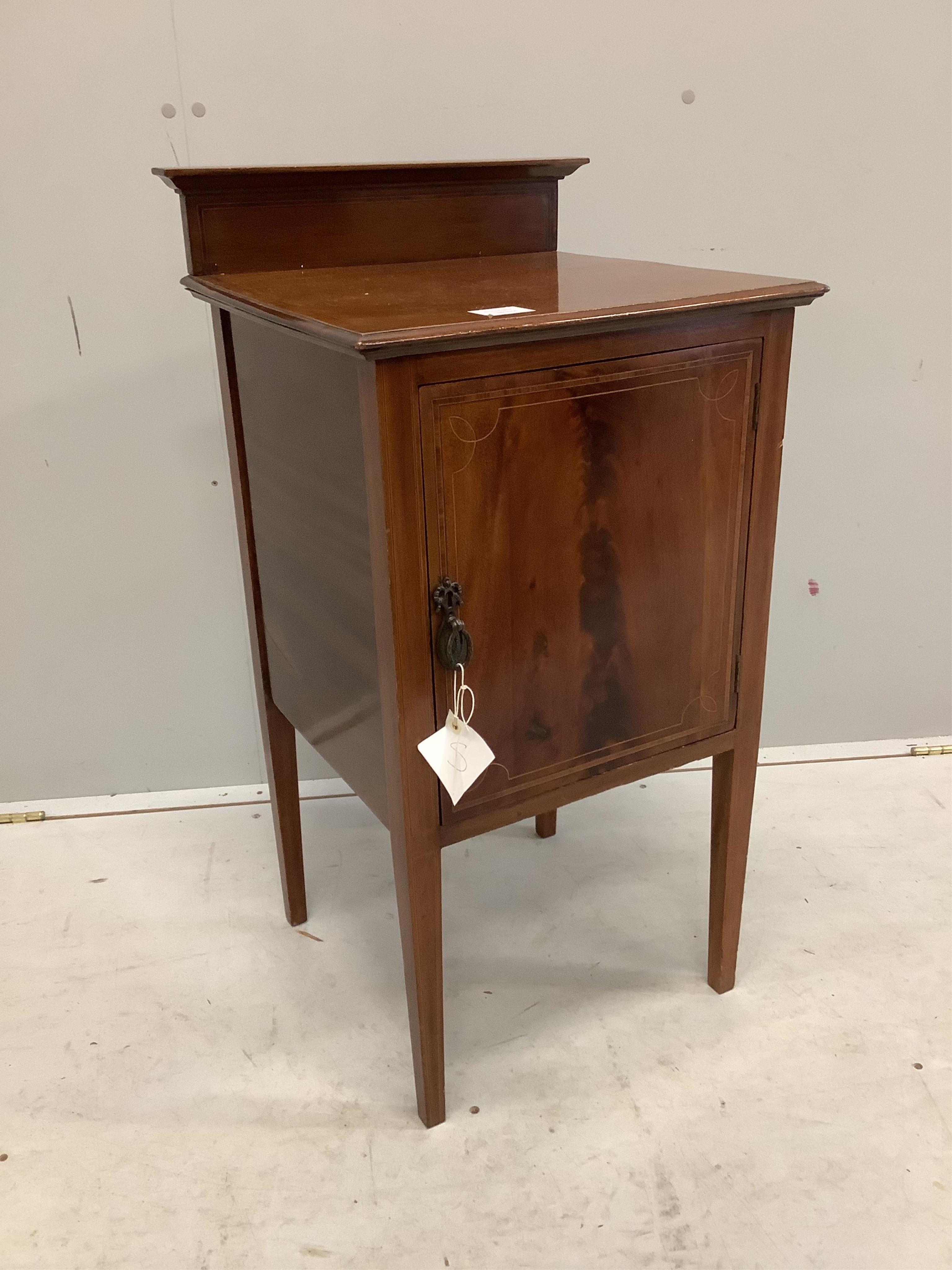 An Edwardian mahogany bedside cabinet on square tapered legs, width 42cm, depth 41cm, height 83cm. Condition - fair